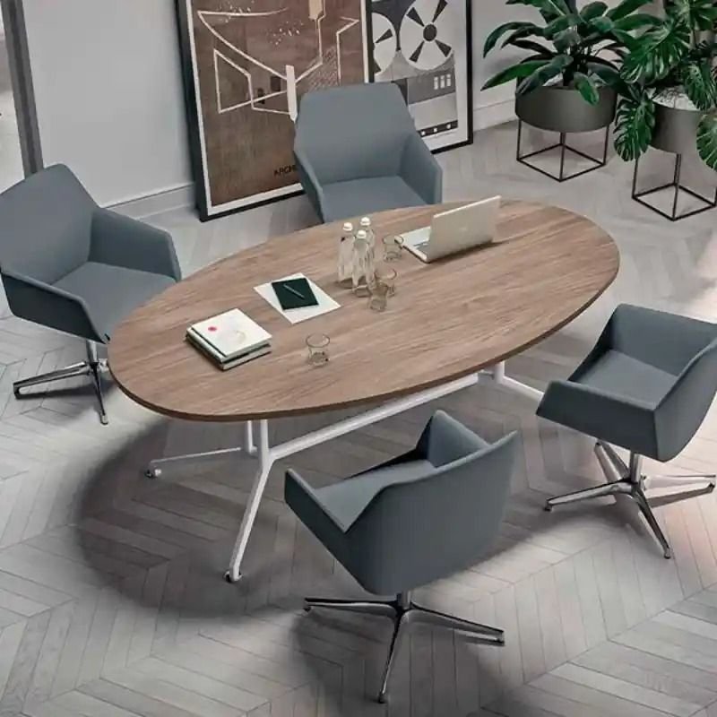 Mobiliario para Sala de Juntas en Del Valle y Nápoles | Quantum Espacios Funcionales Benito Juárez Mobiliario para sala de juntas en Alcaldía Benito Juárez con mesa ovalada en nogal, base en metal blanco, sillones ejecutivos tapizados en azul grisáceo y base cromada para despachos en Del Valle, Nápoles y San Pedro de los Pinos